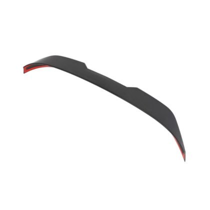 Close-up of dry carbon fiber rear trunk spoiler installed on BMW M2 G87, enhancing aerodynamic downforce and sporty appearance